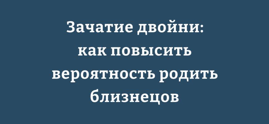 Семья с близнецами на прогулке в парке